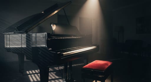 Spotlit Grand Piano Reflections