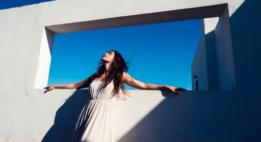 Model Against White Plaster Wall